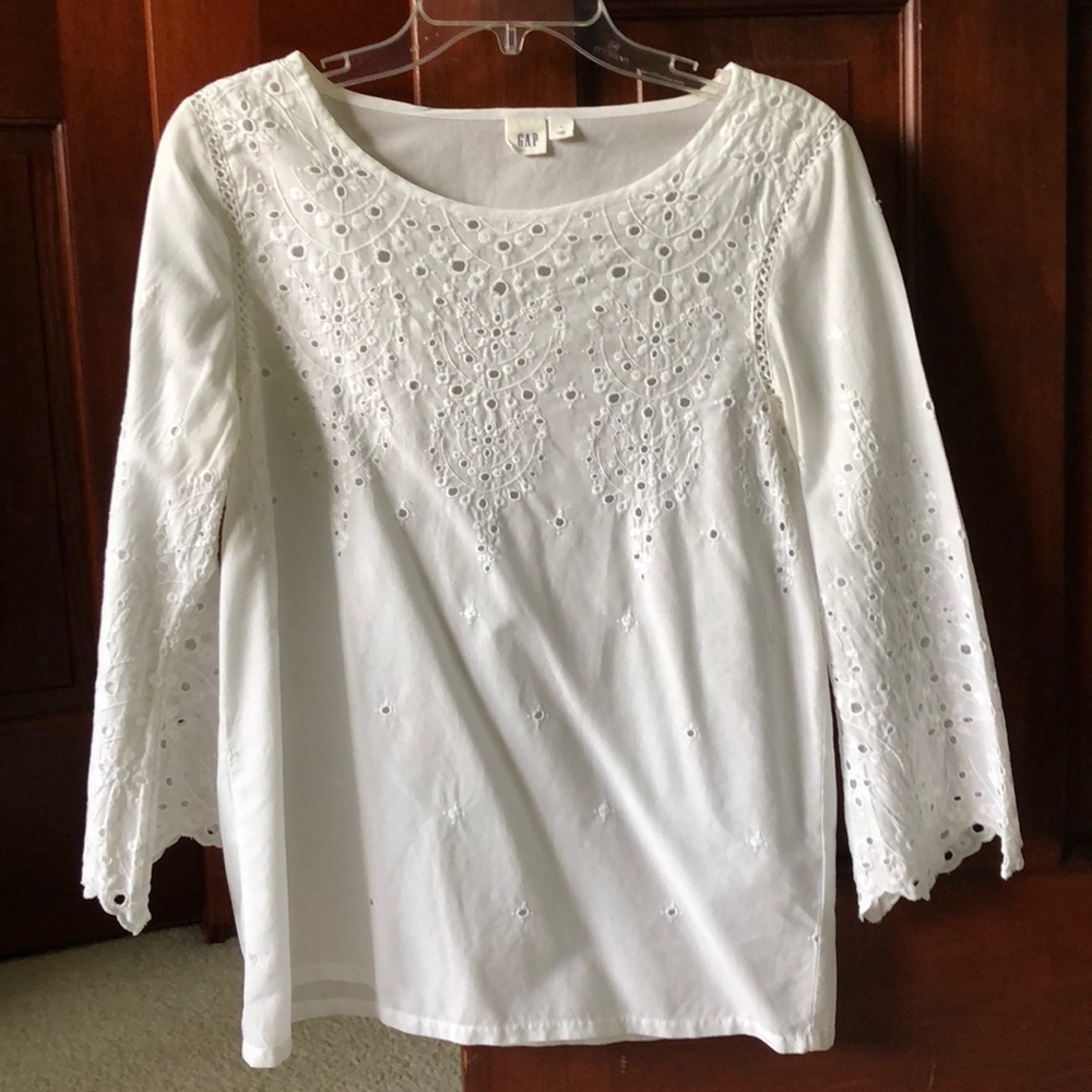 White blouse with eyelet details